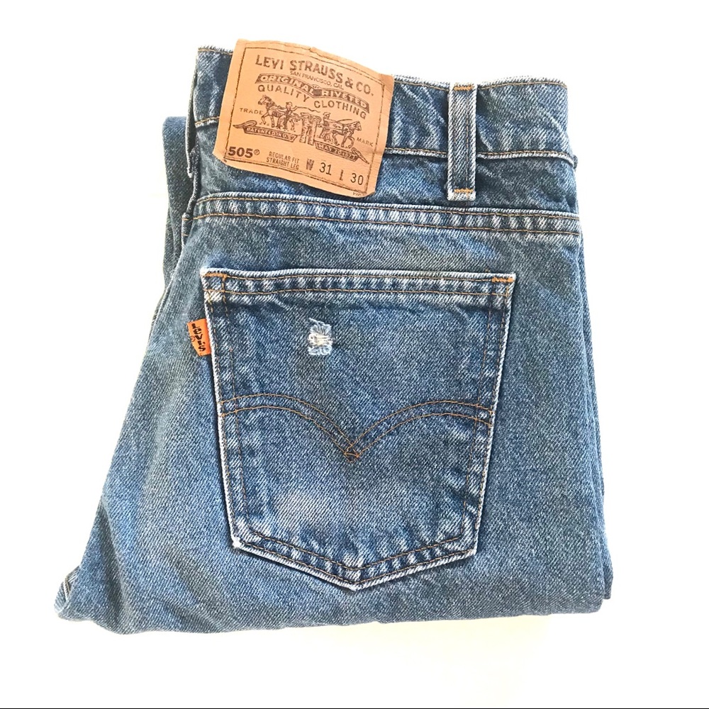 Vintage high waist orange tab Levis jeans